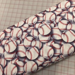 Half yard cut of Baseballs - Continuous Yardage available, sold by the half yard