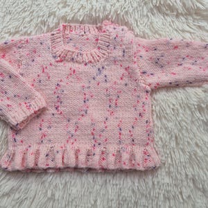 Maglione rosa per neonati lavorato a mano: maglione scintillante maculato (0-3 mesi)