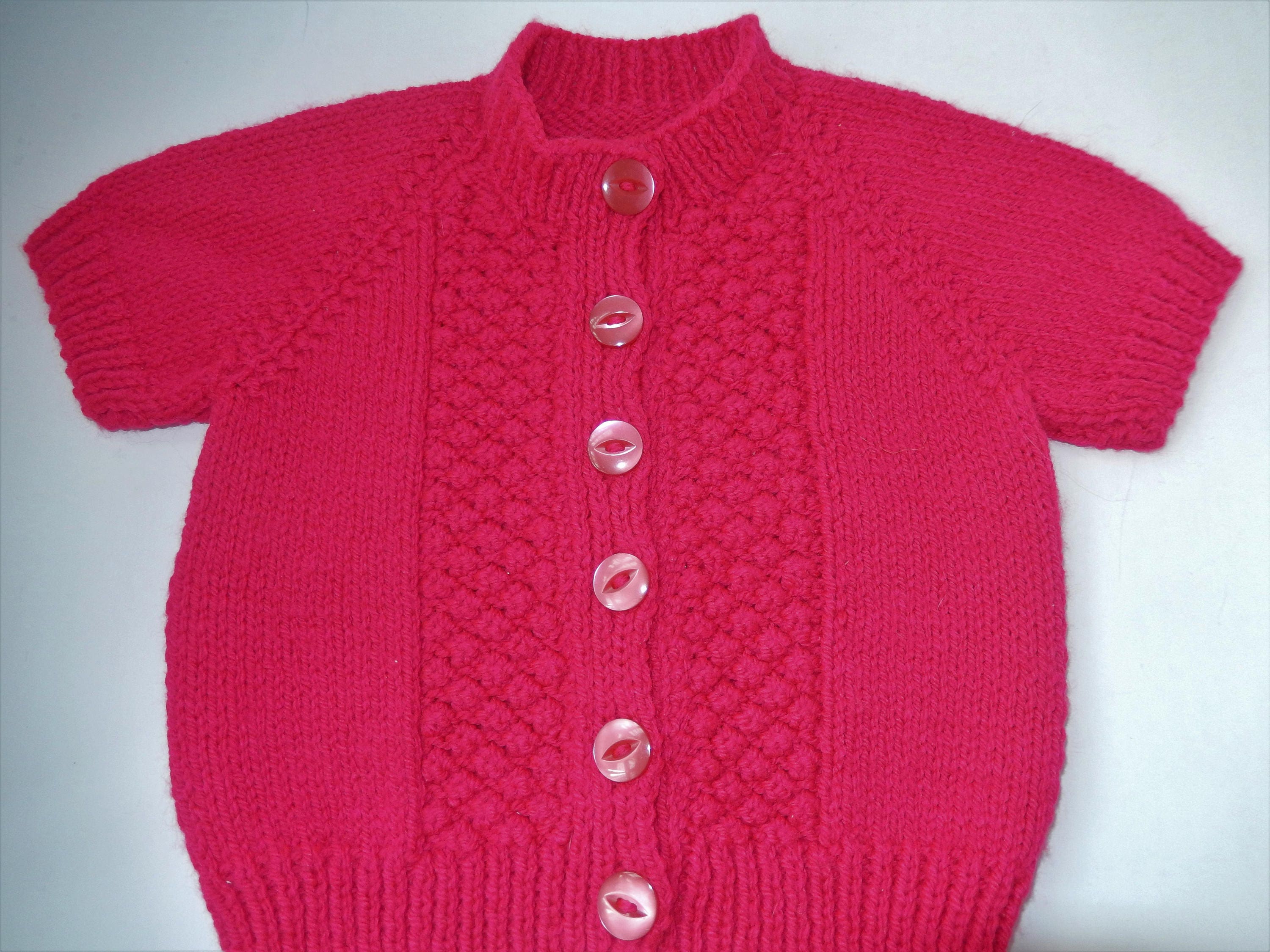 cerise pink cardigan