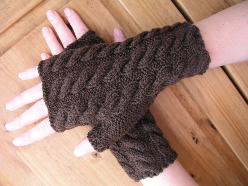 Brown cable hand knitted wrist wamers / fingerless gloves image 0