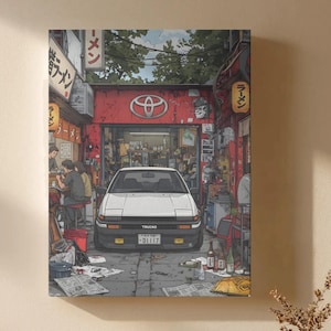 May include: A vertical wall art print depicting a white Toyota Trueno car parked inside a cluttered red garage with Japanese signage. The scene includes people sitting at a counter, scattered newspapers, bottles, and a Toyota logo on the back wall.