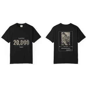 Front and back of the shirt side by side, Black Comfort Colors tee: I need about 20,000 leagues / of personal space.
