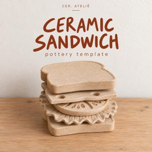 May include: A stack of beige ceramic pottery templates shaped like sandwich ingredients, including bread slices, a cheese slice with holes, a tomato slice, and a ruffled lettuce leaf. The text CER. ATELIÊ CERAMIC SANDWICH pottery template is visible.