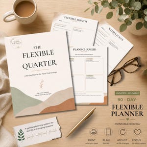 May include: A 90-day planner titled The Flexible Quarter with a beige cover featuring abstract green and terracotta hills. The set includes printed pages for flexible months, weekly focus, and plans changed, alongside a gold pen and glasses.