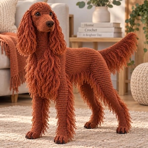 May include: A handcrafted crochet dog figurine in a rich rust-orange color. The figure features long, textured, fringed ears and a matching bushy tail, with dark brown eyes and a dark nose, standing on four legs with visible paw details.