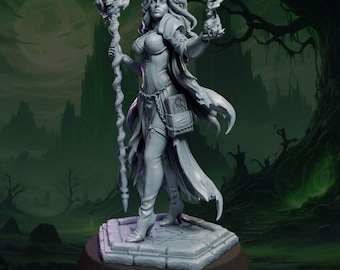 May include: A gray resin tabletop miniature of a spellcaster standing on a stone base. The figure wears a fitted bodice and long coat, holding a staff topped with a skull in one hand and a small flame in the other, with a book at the waist.