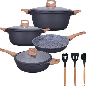 May include: A cookware set featuring two black pots with glass lids, a black frying pan with a speckled interior, and a black sauté pan with a glass lid. All items have light wood-toned handles. Three black silicone kitchen utensils with wood handles.