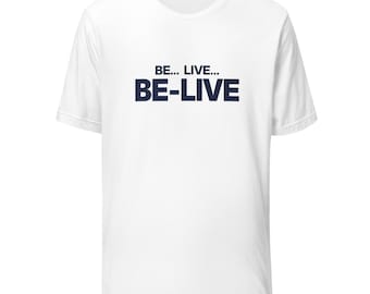 May include: A white short-sleeved t-shirt featuring the dark blue text BE... LIVE... BE-LIVE printed in a bold, sans-serif font across the center of the chest. The garment has a classic crew neckline and a standard, straight-cut silhouette.