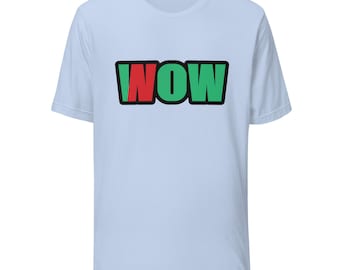May include: A light blue short-sleeve t-shirt featuring the word WOW printed in a bold, block-style font across the chest. The letter W is green, the letter O is green, and the letter N is red, all outlined in a thick black border.