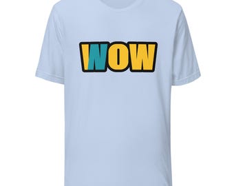 May include: A light blue short-sleeve t-shirt featuring the word WOW printed in the center. The letter W is yellow, the letter O is yellow, and the letter W is yellow, with the first letter W partially filled with a teal color. The text has a thick black outline.