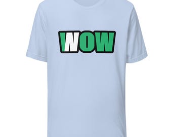 May include: A light blue short-sleeve t-shirt featuring a graphic on the chest. The graphic displays the text WOW in bold green letters with a thick black outline, with the letter W partially filled with a white vertical stripe.