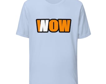 May include: A light blue short-sleeve t-shirt featuring the word WOW printed in the center. The letters are orange with a thick black outline, except for the letter W which is white with a black outline, creating a bold graphic design.