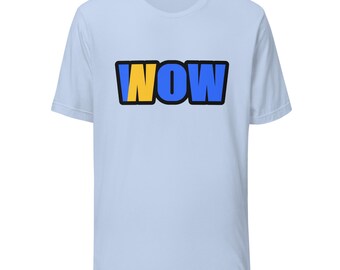 May include: A light blue short-sleeve t-shirt featuring the word WOW printed in the center. The letter W is yellow, while the letters O and W are blue. Each letter is outlined in a thick black border, creating a bold graphic design.