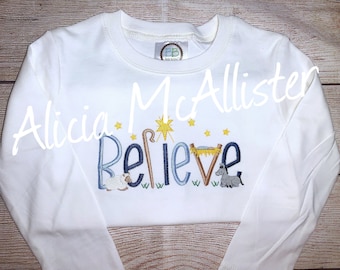 Cream nativity believe tee