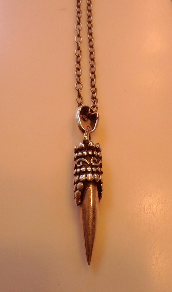 Items similar to Prick Beautiful metal spike pendant necklace on Etsy