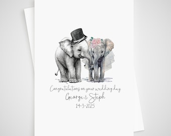 May include: A wedding card with a watercolor illustration of two elephants dressed as a bride and groom. The text reads "Congratulations on your wedding day George & Steph 14-3-2025".