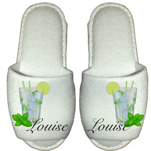 May include: White slipper with a green lime and mint mojito drink graphic and the name Louise printed on the front.