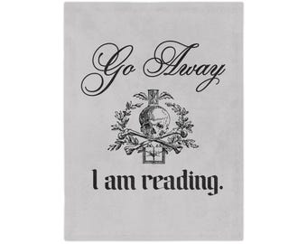 Go Away I Am Reading Blanket | Skull Crest Reading Quote Throw
