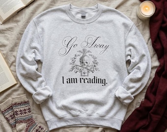 Go Away I Am Reading sweatshirt | Reading Skull Book Illustration