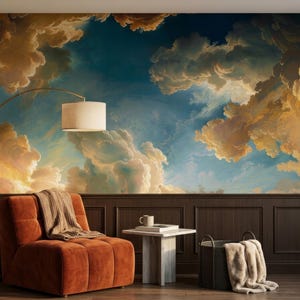 May include: A wall mural featuring a dramatic sky with golden-lit clouds against a deep blue backdrop. The room includes a burnt orange upholstered chair with a textured throw, a white side table, a floor lamp, and a dark woven basket.