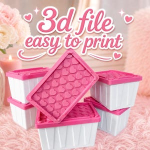 May include: Several small white rectangular storage bins with bright pink lids featuring a raised heart pattern. The text 3d file easy to print is displayed in pink cursive script above the containers, which are arranged in a cluster.