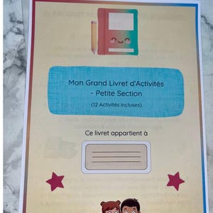 May include: A printable A4 activity booklet titled Mon Grand Livret d'Activités - Petite Section with 12 activities included. The cover features a cartoon notebook, two children reading a book, two pink stars, and a name label field.