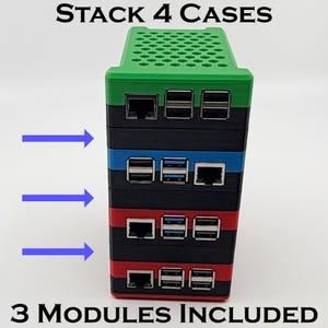 May include: A vertical stack of four computer cases with a green top, alternating black and colored middle sections, and a red base. The text STACK 4 CASES appears at the top and 3 MODULES INCLUDED at the bottom. Three blue arrows point to the middle.