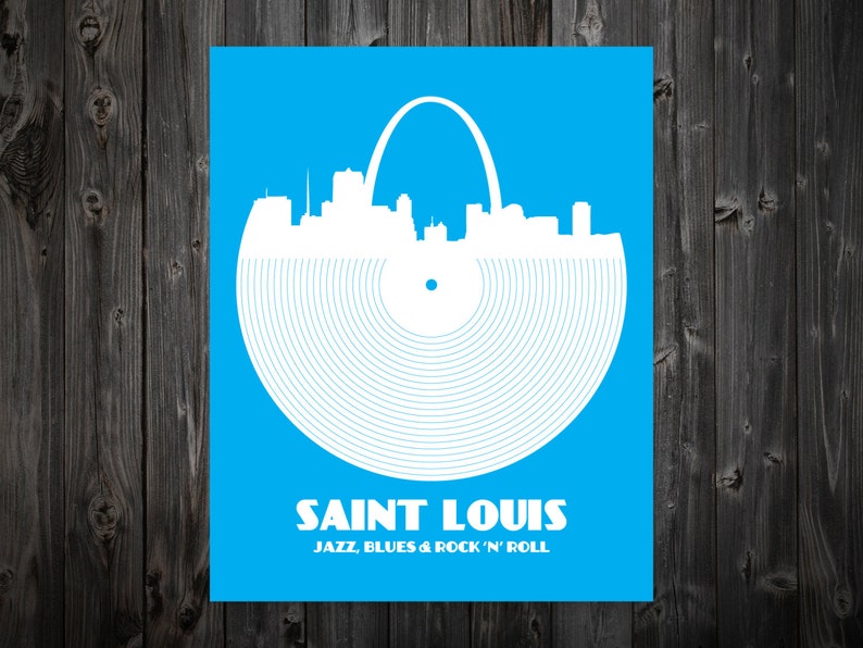 May include: A blue and white graphic design featuring the St. Louis skyline with the Gateway Arch. The skyline is depicted as a record with the text "SAINT LOUIS JAZZ, BLUES & ROCK 'N' ROLL" below.