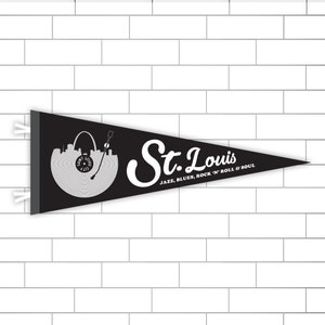 May include: Black and white pennant with a record and the St. Louis skyline. The text reads "St. Louis Jazz, Blues, Rock 'n' Roll & Soul".