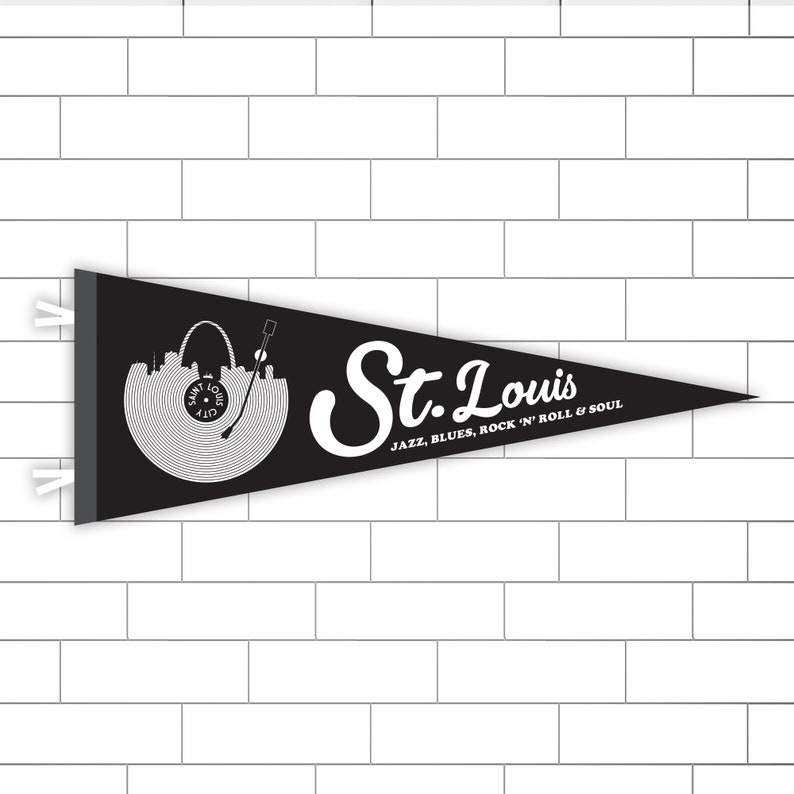 May include: Black and white pennant with a record and the St. Louis skyline. The text reads "St. Louis Jazz, Blues, Rock 'n' Roll & Soul".