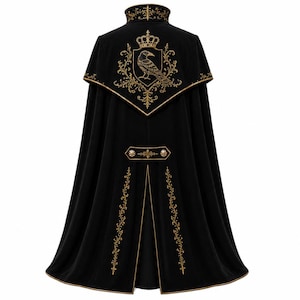 May include: A black cape featuring gold embroidery. The back displays a crest with a crown and a bird, flanked by ornate scrollwork. A horizontal tab with two gold buttons sits above a central vent, with vertical floral embroidery on the lower panels.