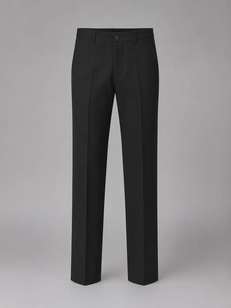 May include: A pair of solid black trousers featuring a structured waistband with a single button closure, a zippered fly, and belt loops. The pants have a straight-leg cut with a clean, pressed crease running down the center of each leg.