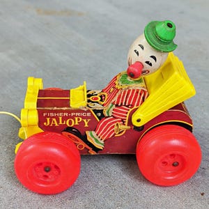 Fisher-Price Jalopy Pull Toy Clown Car w/ Pull String & Red Wheels