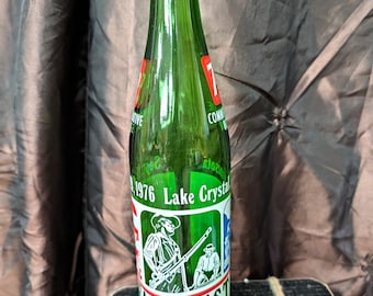 Botella de refresco conmemorativa 7 Up 1976, Lake Crystal, Minnesota, 295 ml (10 onzas líquidas), vidrio verde.