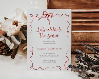 May include: A white invitation card with red lettering and a red ribbon bow. The text reads "Let's celebrate The Season" and includes details for a Christmas celebration on December 14th at 6:00 pm at The Millers House, 123 Main Road, Philadelphia, PA.  Kindly RSVP by December 1st to Emma at 333 456 789.
