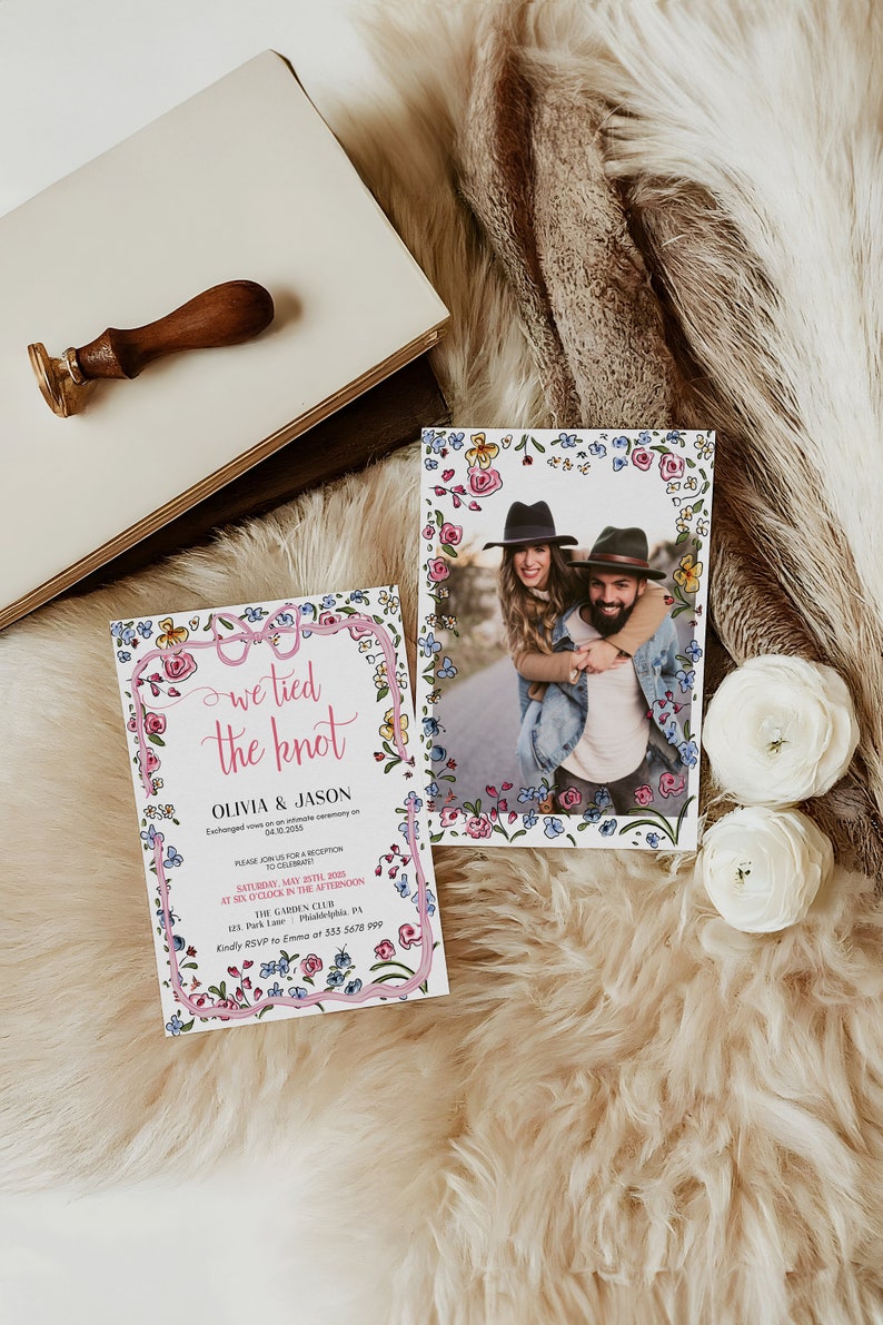 May include: A floral wedding invitation with a pink and white border. The invitation reads "We tied the knot" with the couple's names, Olivia and Jason, and the date of their wedding. The invitation also includes details about the reception, including the date, time, and location.