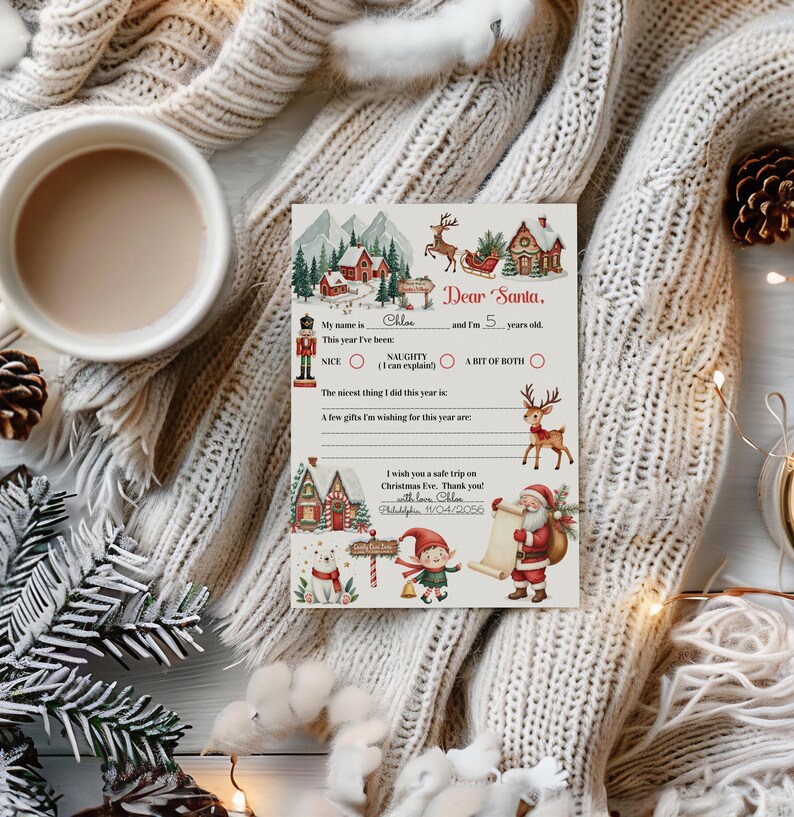 May include: A festive Christmas letter to Santa, featuring illustrations of a winter village, reindeer, and Santa Claus. The letter is personalized with the name "Chloe" and space for wishes. A mug of coffee and pine cones are in the background.