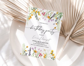 May include: A floral birthday party invitation with a watercolor design of wildflowers in shades of yellow, pink, purple, and green. The text reads "Please join us for a birthday party in honor of Emma Davenport, Saturday, June 10th, 2023 at 2:00 PM, The Garden Club Cafe, 123 Park Avenue, Philadelphia, PA. Kindly RSVP to Madeline Baker at 333 4687 890."