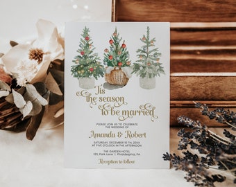 May include: A Christmas-themed wedding invitation with a watercolor illustration of three decorated Christmas trees in pots. The text reads "Tis the season to be married" and includes the couple's names, wedding date, time, and location.