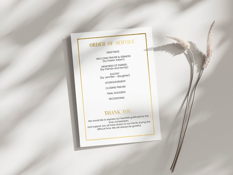 May include: A white card with a gold border and text that reads "Order of Service". The text lists the order of events for a memorial service, including greetings, welcome prayer, memories, eulogy, acknowledgement, closing prayer, final goodbye, and recessional. The card also includes a thank you message.