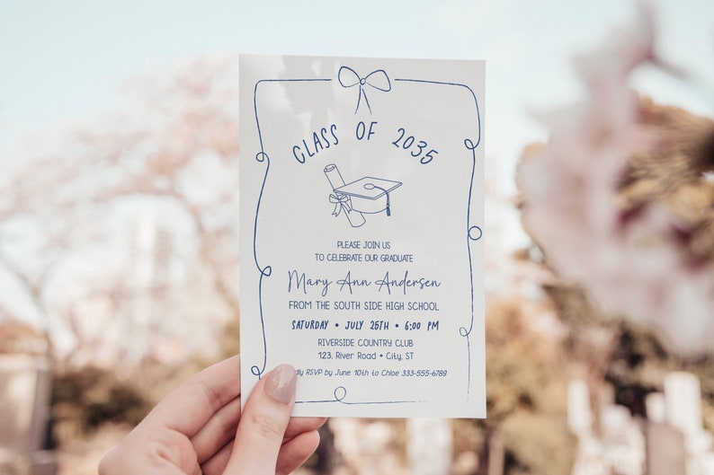 May include: A white graduation invitation with blue text and a hand-drawn illustration of a graduation cap and diploma. The invitation reads "Class of 2035" and includes the graduate's name, "Mary Ann Andersen", the date and time of the graduation ceremony, and the location of the event.