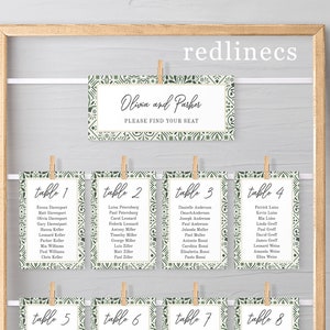 May include: A set of eight green and white table cards with a geometric pattern. Each card has a table number and a list of names. The top card says "Olivia and Parker" and "Please find your seat."