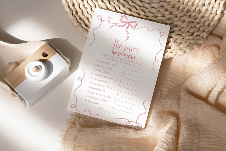 K&ouml;nnte beinhalten: Eine rosa und wei&szlig;e druckbare Babyparty-Spielkarte mit dem Text "Der Preis ist richtig". Das Spiel fordert die G&auml;ste auf, den Preis verschiedener Babyartikel zu erraten.