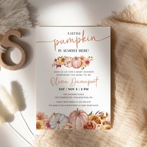 May include: A baby shower invitation with a watercolor illustration of pumpkins and fall flowers. The text reads "A little pumpkin is almost here!" and includes the name "Olivia Davenport" and the date and time of the shower.