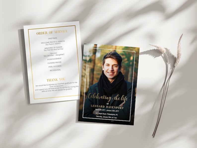 May include: A black and white funeral program with gold lettering. The program lists the order of service for a memorial service. The program also includes a photo of a young man with a warm smile. The text reads "Celebrating the life of Leonard Davenport".