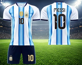 May include: A white and light blue striped soccer jersey with the number 10, the AFA crest, and a FIFA patch on the front. The back features the name MESSI and the number 10. Dark blue shorts with the number 10 and AFA crest are also included.