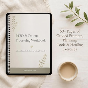 May include: A spiral-bound PTSD & Trauma Processing Workbook with a beige cover featuring leaf illustrations and the text: PTSD & Trauma Processing Workbook, A Gentle Space for Reflection, Healing & Growth, and Reflect. Process. Grow.
