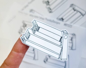 May include: A black and white line drawing of a bookshelf with books on the shelves. The drawing is on a white background.
