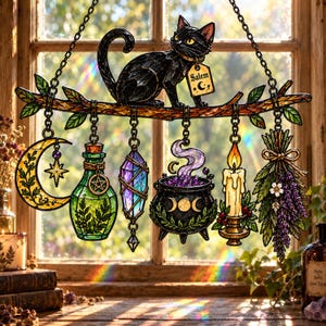 May include: A stained glass suncatcher featuring a black cat perched on a branch with a tag labeled Salem. Hanging from the branch are charms including a crescent moon, a green potion bottle, a crystal, a cauldron, a candle, and lavender.