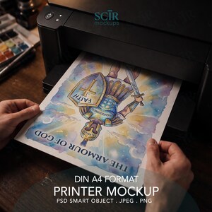 May include: A black printer outputting a sheet of paper featuring a watercolor illustration of a warrior in armor. The artwork includes the text THE ARMOUR OF GOD, FAITH, RIGHTEOUSNESS, SALVATION, TRUTH, and SPIRIT, depicting a shield and sword.